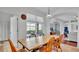 Kitchen and dining area with wood table and lake view at 4512 Brookshire Pl, Lake Wales, FL 33898