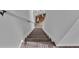 Carpeted staircase leading to the upper level at 4512 Brookshire Pl, Lake Wales, FL 33898