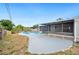 Spacious backyard and screened in porch with concrete deck, perfect for outdoor activities at 4718 Valley Hill Ct, Lakeland, FL 33813
