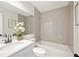Updated bathroom featuring a modern vanity, subway tile shower, and stylish fixtures, creating a serene retreat at 4718 Valley Hill Ct, Lakeland, FL 33813