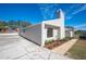 Newly renovated house exterior with modern design and landscaping at 4718 Valley Hill Ct, Lakeland, FL 33813