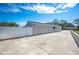 Two-car garage with a long driveway at 4718 Valley Hill Ct, Lakeland, FL 33813