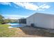 House exterior with a screened porch and pool at 4718 Valley Hill Ct, Lakeland, FL 33813