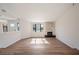 Living room with stone fireplace and hardwood floors at 4718 Valley Hill Ct, Lakeland, FL 33813