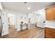 Bright and open floor plan with wood flooring and white walls offering a spacious living and kitchen area at 4718 Valley Hill Ct, Lakeland, FL 33813