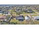 Aerial view of house showcasing backyard and detached garage at 5125 Pheasant Dr, Mulberry, FL 33860