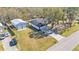 Aerial view of house, detached garage, and driveway at 5125 Pheasant Dr, Mulberry, FL 33860