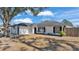 Renovated single-story home with attached garage and large front yard at 5125 Pheasant Dr, Mulberry, FL 33860