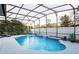 Screened pool area with patio furniture at 518 Grand Reserve Dr, Davenport, FL 33837