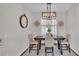 Charming dining room featuring a rustic table and chandelier at 5181 Ashwood Dr, Lakeland, FL 33811