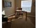 Home office features a desk, chair, and large window at 5269 Pebble Beach Blvd, Winter Haven, FL 33884