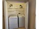 Bright laundry room with washer and dryer included at 5269 Pebble Beach Blvd, Winter Haven, FL 33884