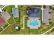 Overhead view of community pool, surrounded by ample lounge chairs at 5440 Siltstone St, Lakeland, FL 33811