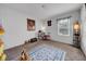 Bedroom with a rug, bookshelf and window at 5557 Oro Valley Rd, Auburndale, FL 33823