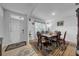 Bright dining room featuring a wooden table and chairs, ideal for Gathering meals at 5557 Oro Valley Rd, Auburndale, FL 33823