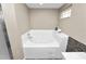 Bathroom with a luxurious soaking tub at 5819 Driftwood Dr, Winter Haven, FL 33884