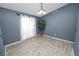 Empty dining room with light walls and wood-look floors at 5819 Driftwood Dr, Winter Haven, FL 33884