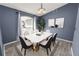 Elegant dining room with wood-look floors and stylish decor at 5819 Driftwood Dr, Winter Haven, FL 33884