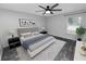 Main bedroom with ceiling fan and stylish decor at 5819 Driftwood Dr, Winter Haven, FL 33884