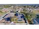 Aerial view of house with pool and surrounding homes at 5825 High Ridge Loop, Lakeland, FL 33812