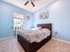 Bedroom with a double bed and plenty of natural light at 5825 High Ridge Loop, Lakeland, FL 33812