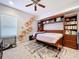 Bedroom with built-in murphy bed and hexagon shelves at 5825 High Ridge Loop, Lakeland, FL 33812