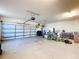 Garage interior with plenty of space and shelving for storage at 5825 High Ridge Loop, Lakeland, FL 33812