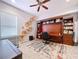 Home office with built-in desk and shelving unit at 5825 High Ridge Loop, Lakeland, FL 33812