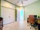 Bright home office features built-in cabinets and view into bedroom at 5825 High Ridge Loop, Lakeland, FL 33812