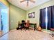 Home office with a desk, chair and guitar at 5825 High Ridge Loop, Lakeland, FL 33812