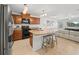 Modern kitchen with granite countertops and wooden cabinets at 5876 Great Salt Ct, Lakeland, FL 33805