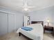 Guest bedroom with double bed and ceiling fan at 6087 Southern Oaks Se Dr, Winter Haven, FL 33884