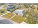 Aerial view of single-story home with pool and fenced backyard at 6357 Neamathla Dr, Lakeland, FL 33813