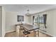 Bright dining area with farmhouse table and large window at 6357 Neamathla Dr, Lakeland, FL 33813