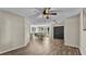 Bright dining area with wood-look floors and a ceiling fan at 6357 Neamathla Dr, Lakeland, FL 33813