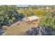 Aerial view of barn with horses at 7030 Klein Rd, Lakeland, FL 33813