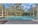 Inviting screened pool with ample deck space at 7030 Klein Rd, Lakeland, FL 33813