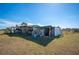 Rustic workshop with covered shelter and tools at 7275 Lake Hendry Rd, Fort Meade, FL 33841
