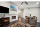 Living room with fireplace, sectional sofa, and dining area at 781 Sagewood Dr, Lakeland, FL 33813