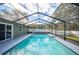 Inviting screened pool with spacious deck at 781 Sagewood Dr, Lakeland, FL 33813