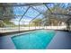 Escape to this tranquil screened pool at 781 Sagewood Dr, Lakeland, FL 33813