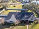 House with gray roof and brick facade, backyard at 825 E Mann Rd, Bartow, FL 33830