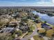 Neighborhood overview featuring lakefront homes and community at 825 E Mann Rd, Bartow, FL 33830