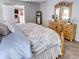 Bright bedroom with king-size bed and ample closet space at 825 E Mann Rd, Bartow, FL 33830