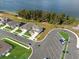 Aerial view of a house near a lake, highlighting waterfront community living at 951 Craftsman Rd, Eagle Lake, FL 33839