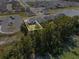 Aerial view of a house and backyard by the lake at 951 Craftsman Rd, Eagle Lake, FL 33839