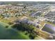 Wide aerial view of a large lakefront community at 951 Craftsman Rd, Eagle Lake, FL 33839