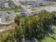 Aerial view showcasing a house's backyard and surrounding neighborhood at 951 Craftsman Rd, Eagle Lake, FL 33839