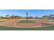 Community basketball court with well-maintained surface and neighborhood home backdrop at 951 Craftsman Rd, Eagle Lake, FL 33839