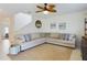 Living room with sectional sofa and ceiling fan at 951 Craftsman Rd, Eagle Lake, FL 33839